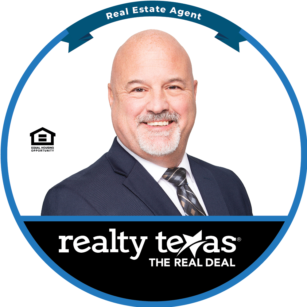 Tom Grundy - Real Estate Agent